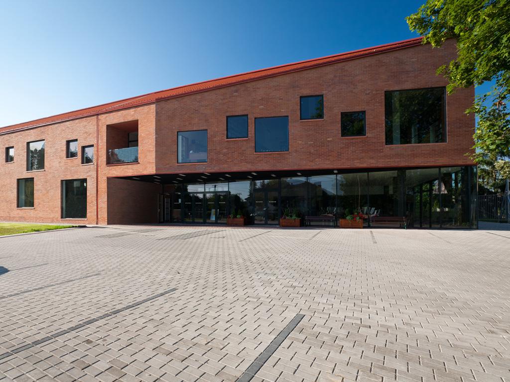 The entrance could thus be joined to a public space which creates a picturesque way for visitors to approach the building as well as serving as the venue of important community activities (e.g. fairs)
